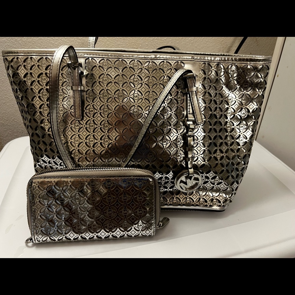 Michael Kors Silver perforated tote purse and wallet Gently Used!